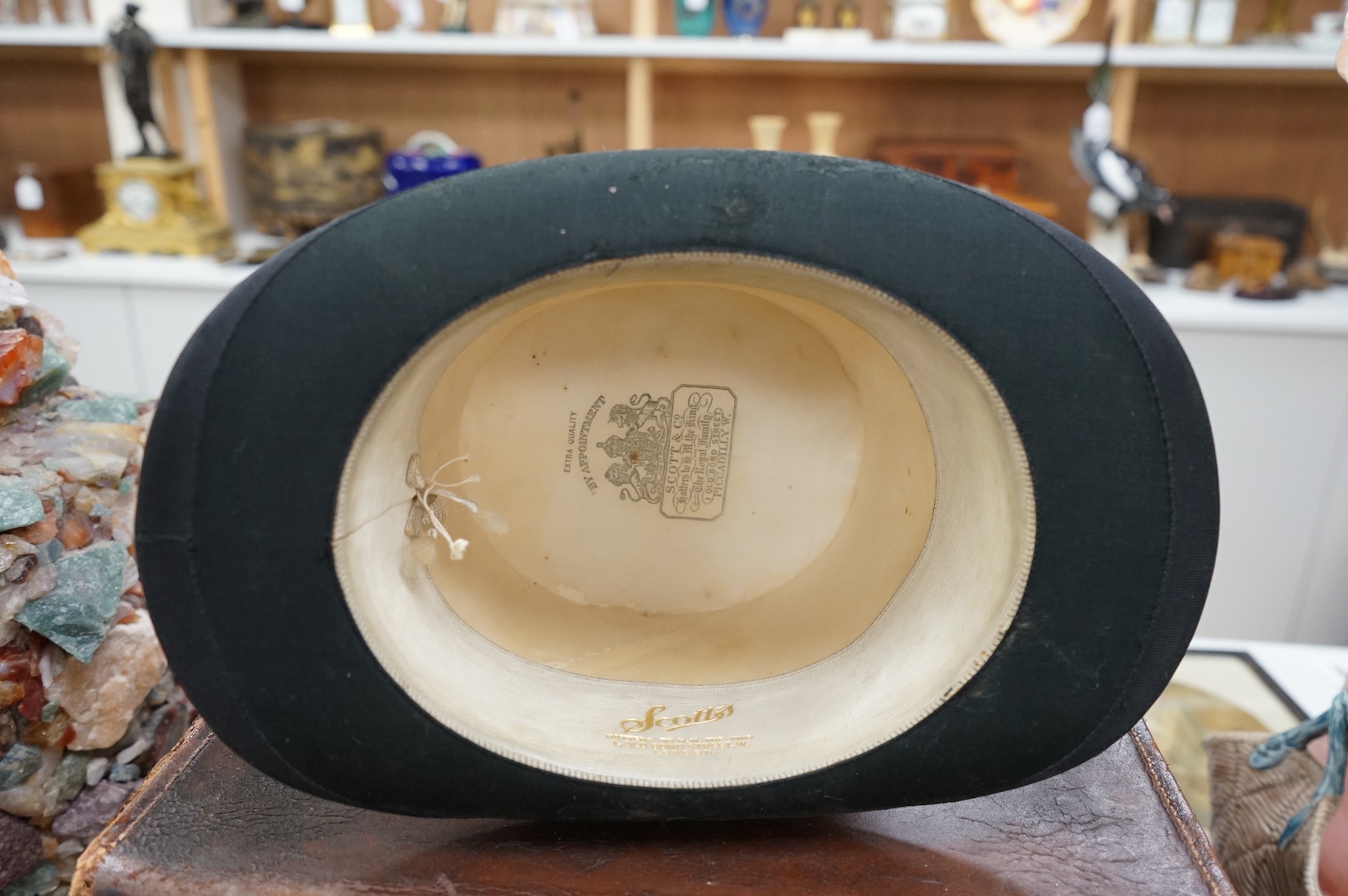 A Scott & Co. top hat with brush in leather case, together with a cased opera hat.